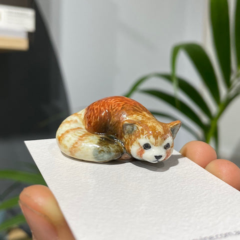 Red Panda Sleeping Porcelain Figurine